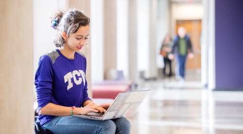 Girl watching videos on her computer